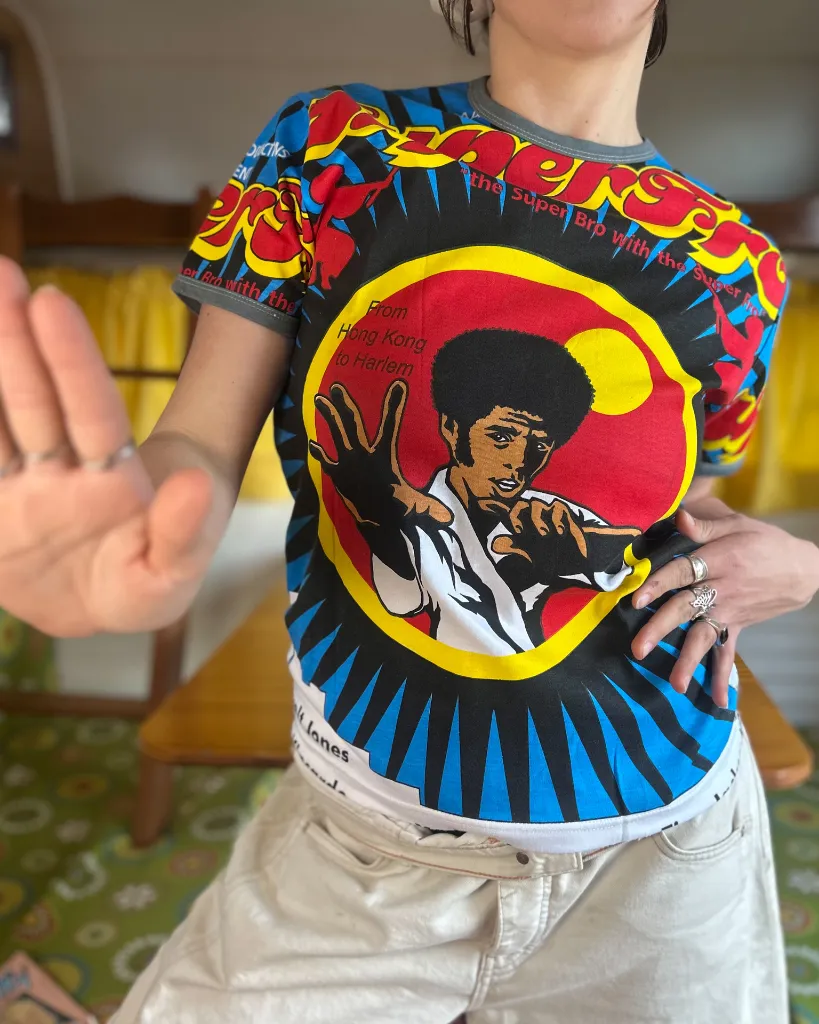 [006] Work by Eaksak, Jim Kelly SuperFro, Interlock tee